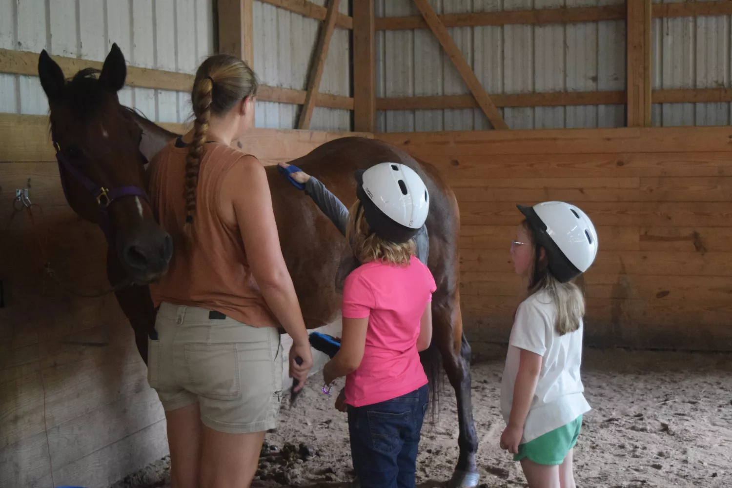 campers and staff with a horse