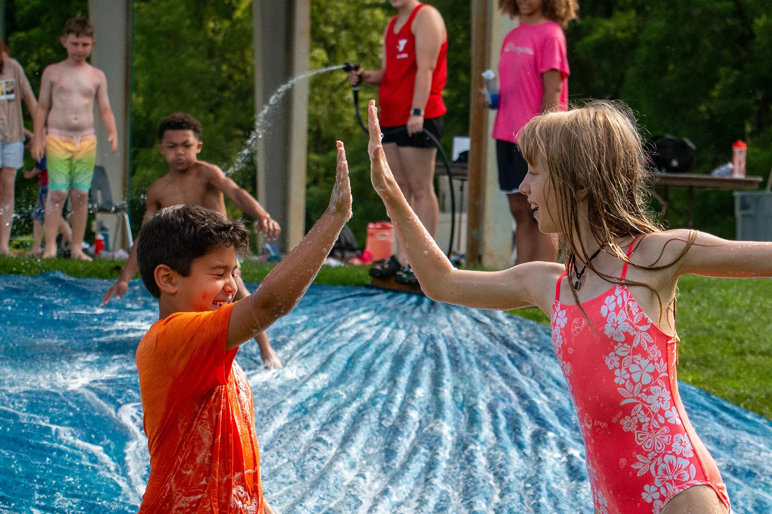 campers high fiving